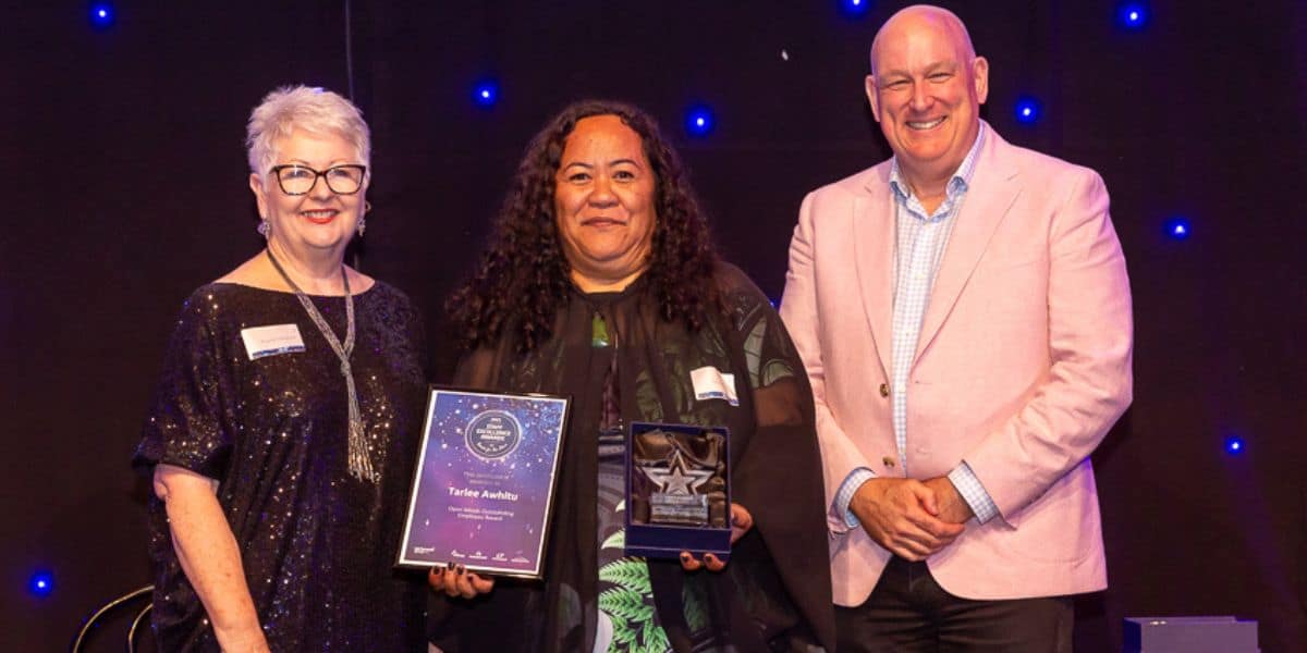 Angela Tillmanns, Group Board Chair, (standing on the left), Tarlee Awhitu, Support Worker (centre), David Withers, Group Board Director (right).